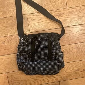 LeSportsac cross body drawstring bag